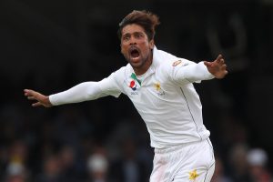 LONDON, ENGLAND - JULY 15: Mohammad Amir of Pakistan celebrates after dismissing the England captain Alastair Cook during day 2 of the First Investec Test match between England and Pakistan at Lord's Cricket Ground on July 15, 2016 in London, England. (Photo by Sarah Ansell/Getty Images)