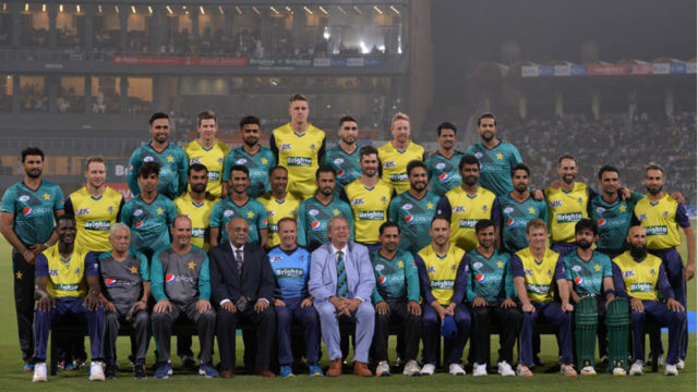 Pakistani and World XI cricket players pose for a photograph at the Gaddafi Cricket Stadium in Lahore on September 13, 2017, before the start of the second Twenty20 international match between the World XI and Pakistan. Photo Courtesy: AFP Pakistani and World XI cricket players pose for a photograph at the Gaddafi Cricket Stadium in Lahore on September 13, 2017, before the start of the second Twenty20 international match between the World XI and Pakistan. Photo Courtesy: AFP