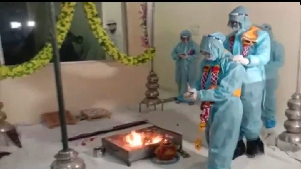Indian couple ties the knot in PPE