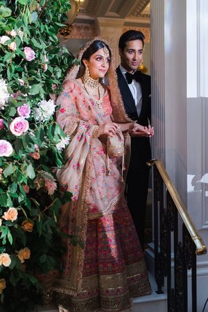 Junaid and Ayesha making an entrance