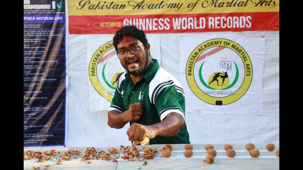 Rashid Naseem cracking open walnuts